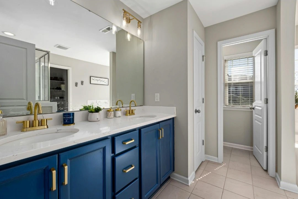 Modern-Bathroom-Remodel-with-Blue-Vanity.webp